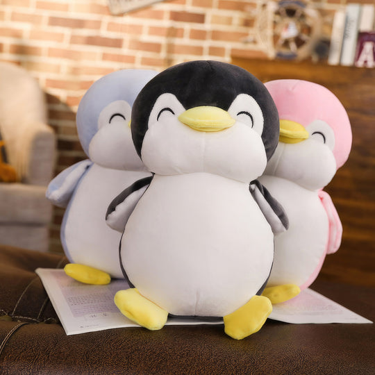A delightful group photo of penguin pals plushies featuring the black, blue, and pink variants. These adorable plushies are designed to look like penguins, and they come in different colors. Penguin Pals, Plushies, Group Photo, Black Variant, Blue Variant, Pink Variant, Penguins, Soft, Cuddly, Toy, Toys, Squishy, Soft Toys, Stuffed Toys, Plush Toy, Plush Toys, Premium, Quality, Adorable, Cuddly, Playful, Collectibles, Huggable, Kids Toys, Children's Gifts, Gift Ideas, Gifts, Teddy Bear