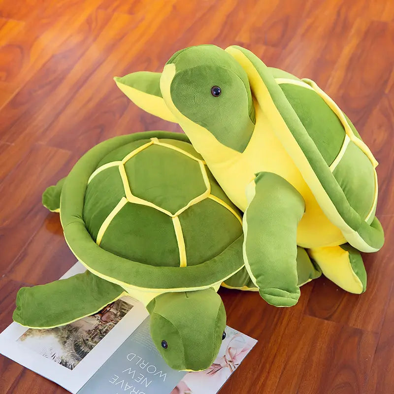 Two Snuggle Turtle plushies, one on top of the other. They are cuddly and feature adorable turtle designs. Snuggle Turtle, Plushies, Stacked, Turtle, Soft, Cuddly, Toy, Toys, Squishy, Soft Toys, Stuffed Toys, Plush Toy, Plush Toys, Premium, Quality, Adorable, Cuddly, Playful, Collectibles, Huggable, Kids Toys, Children's Gifts, Gift Ideas, Gifts, Teddy Bear