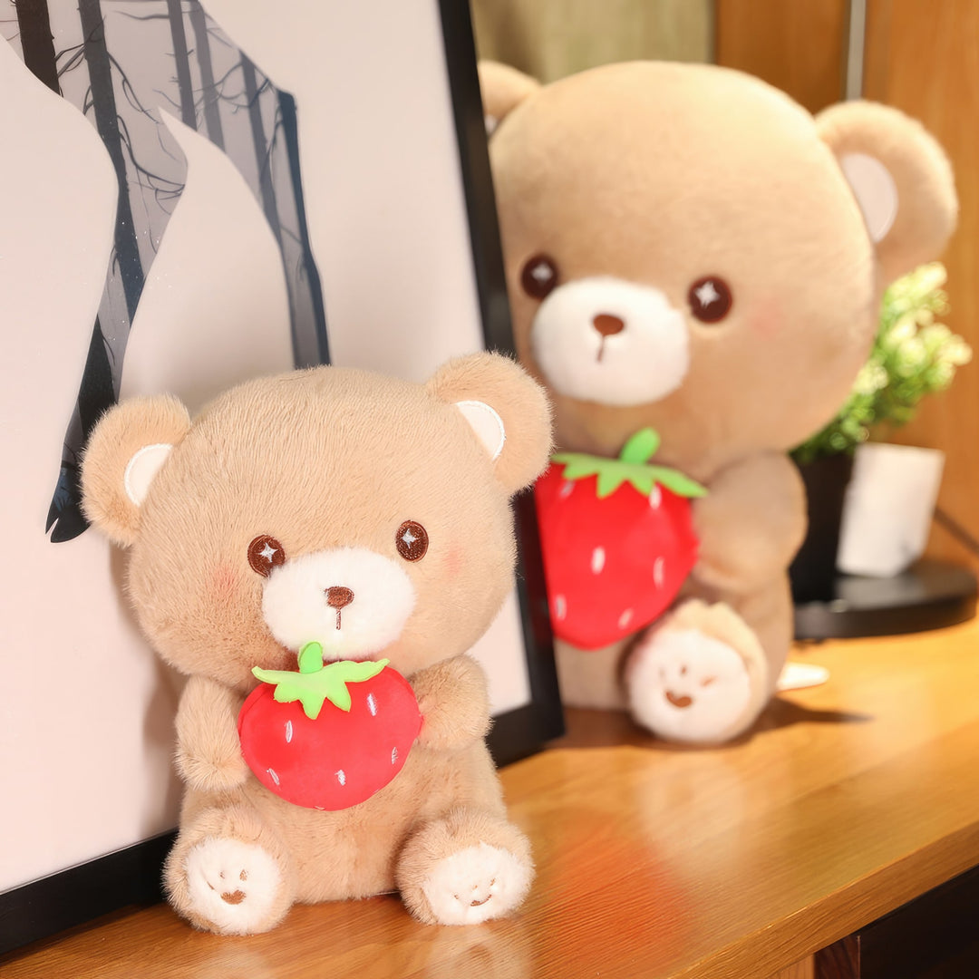A medium and small Strawbear plushie sitting together. The image showcases a medium-sized Strawbear and a smaller version together. Strawbear, Medium/Large Variant, Small Variant, Plushies, Plush Dolls, Cute Plush, Plush, Soft Dolls, Toy Dolls, Toy, Toys, Squishy, Soft, Soft Toys, Stuffed Toys, Plush Toy, Plush Toys, Premium, Quality, Adorable, Cuddly, Playful, Collectibles, Huggable, Kids Toys, Children's Gifts, Gift Ideas, Gift, Gifts, Plush, Teddy Bear